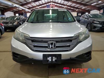 Piąte zdjęcie samochodu w środku: 2013 HONDA CR-V LX VIN:2HKRM4H35DH643017 - miniatura