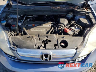 Zdjęcie 12 z 13 samochodu: 2009 HONDA CR-V EX VIN:3CZRE48599G701753 - miniatura