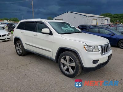 Czwarte zdjęcie samochodu z boku: 2011 JEEP GRAND CHEROKEE LAREDO VIN:1J4RR4GG7BC673063 - miniatura