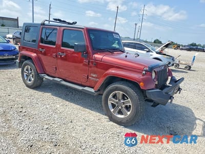 Czwarte zdjęcie samochodu z boku: 2009 JEEP WRANGLER UNLIMITED SAHARA VIN:1J4GA59179L767158 - miniatura