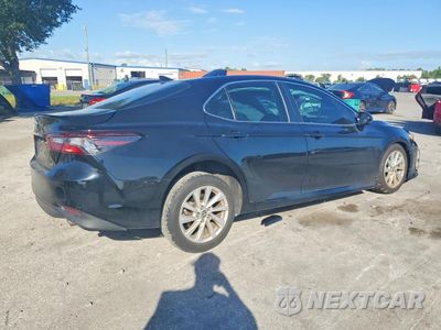 Trzecie zdjęcie samochodu z tyłu: 2024 TOYOTA CAMRY LE VIN:4T1C11AK8RU204272 - miniatura