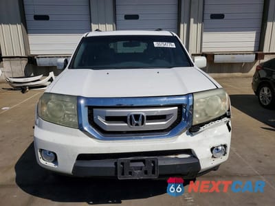 Piąte zdjęcie samochodu w środku: 2010 HONDA PILOT VIN:5FNYF4H69AB025046 - miniatura