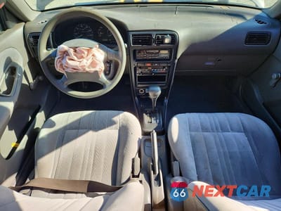 Zdjęcie 8 z 12 samochodu: 1993 NISSAN SENTRA E VIN:JN1EB31F9PU502614 - miniatura