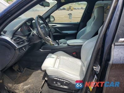 Zdjęcie 7 z 12 samochodu: 2018 BMW X5 M VIN:5YMKT6C58J0X21136 - miniatura
