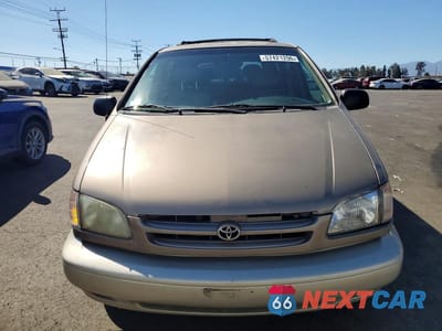 Piąte zdjęcie samochodu w środku: 1999 TOYOTA SIENNA XLE VIN:4T3ZF13C9XU112285 - miniatura