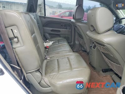 Zdjęcie 11 z 13 samochodu: 2006 HONDA PILOT EX VIN:2HKYF18546H538168 - miniatura