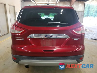 Zdjęcie 6 z 13 samochodu: 2016 FORD ESCAPE TITANIUM VIN:1FMCU9J98GUB67563 - miniatura