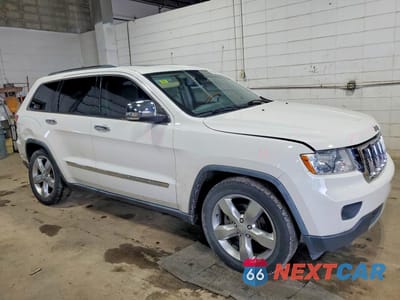 Czwarte zdjęcie samochodu z boku: 2011 JEEP GRAND CHEROKEE OVERLAND VIN:1J4RR6GT1BC606564 - miniatura