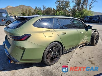 Trzecie zdjęcie samochodu z tyłu: 2026 BMW M5 TOURING VIN:WBS83GV09TCX03202 - miniatura