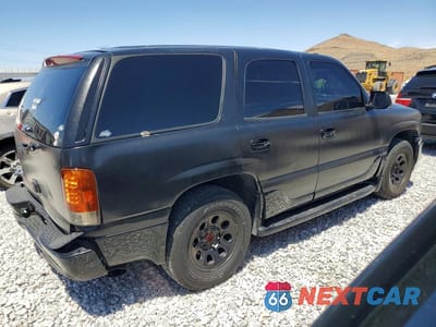Trzecie zdjęcie samochodu z tyłu: 2004 GMC YUKON DENALI VIN:1GKEK63U54J317343 - miniatura