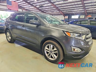 Czwarte zdjęcie samochodu z boku: 2016 FORD EDGE SEL VIN:2FMPK4J99GBC20576 - miniatura