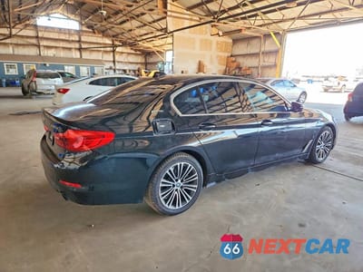 Trzecie zdjęcie samochodu z tyłu: 2019 BMW 530E VIN:WBAJA9C53KB392649 - miniatura