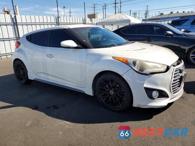 Czwarte zdjęcie samochodu z boku: 2015 HYUNDAI VELOSTER TURBO VIN:KMHTC6AE6FU216904 - miniatura