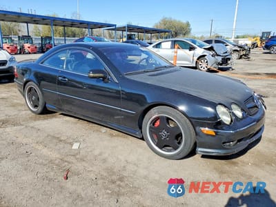 Czwarte zdjęcie samochodu z boku: 2002 MERCEDES-BENZ CL 500 VIN:WDBPJ75J72A029657 - miniatura