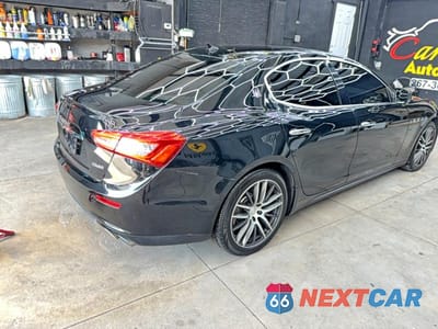 Czwarte zdjęcie samochodu z boku: 2016 MASERATI GHIBLI VIN:ZAM57RTA6G1183267 - miniatura