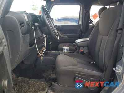 Zdjęcie 7 z 12 samochodu: 2013 JEEP WRANGLER SPORT VIN:1C4AJWAGXDL704324 - miniatura