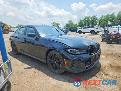 Czwarte zdjęcie samochodu z boku: 2023 BMW 330XI VIN:3MW89FF0XP8D20166 - miniatura