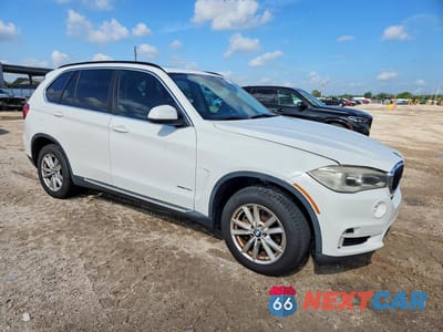 Czwarte zdjęcie samochodu z boku: 2014 BMW X5 SDRIVE35I VIN:5UXKR2C53E0H33251 - miniatura