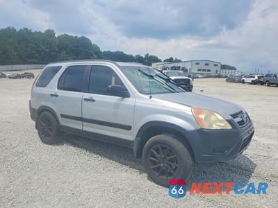 Czwarte zdjęcie samochodu z boku: 2004 HONDA CR-V LX VIN:SHSRD68434U207066 - miniatura