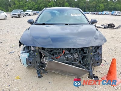 Piąte zdjęcie samochodu w środku: 2019 TOYOTA CAMRY HYBRID XLE VIN:4T1B21HK2KU520819 - miniatura