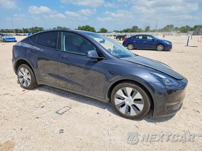 Czwarte zdjęcie samochodu z boku: 2024 TESLA MODEL Y VIN:7SAYGDED7RF018675 - miniatura