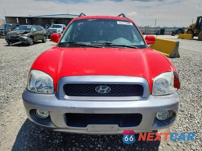 Piąte zdjęcie samochodu w środku: 2003 HYUNDAI SANTA FE VIN:KM8SC13E33U472666 - miniatura