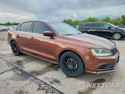 Czwarte zdjęcie samochodu z boku: 2017 VOLKSWAGEN JETTA S VIN:3VW2B7AJ6HM409130 - miniatura
