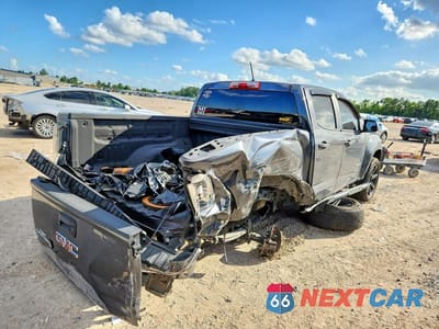 Trzecie zdjęcie samochodu z tyłu: 2016 GMC CANYON VIN:1GTG5BEA7G1131489 - miniatura