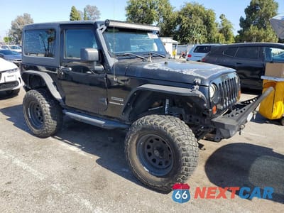 Czwarte zdjęcie samochodu z boku: 2012 JEEP WRANGLER SPORT VIN:1C4AJWAG1CL281115 - miniatura