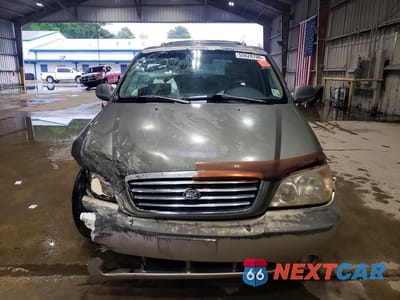 Piąte zdjęcie samochodu w środku: 2003 KIA SEDONA LX VIN:KNDUP131636490338 - miniatura