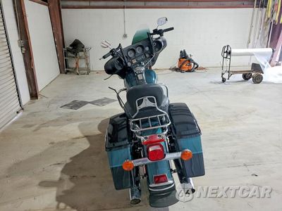 Czwarte zdjęcie samochodu z boku: 2002 HARLEY-DAVIDSON FLHTCUI VIN:1HD1FCW142Y617974 - miniatura