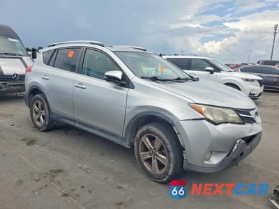 Czwarte zdjęcie samochodu z boku: 2015 TOYOTA RAV4 XLE VIN:2T3WFREV7FW177845 - miniatura