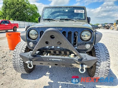 Piąte zdjęcie samochodu w środku: 2016 JEEP WRANGLER SPORT VIN:1C4AJWAG8GL137258 - miniatura