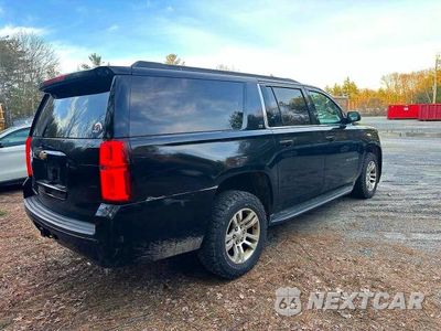 Czwarte zdjęcie samochodu z boku: 2015 CHEVROLET SUBURBAN K1500 LS VIN:1GNSKHKCXFR162688 - miniatura