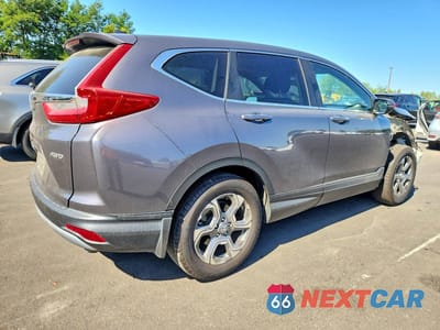 Trzecie zdjęcie samochodu z tyłu: 2018 HONDA CR-V EX VIN:2HKRW2H54JH642789 - miniatura