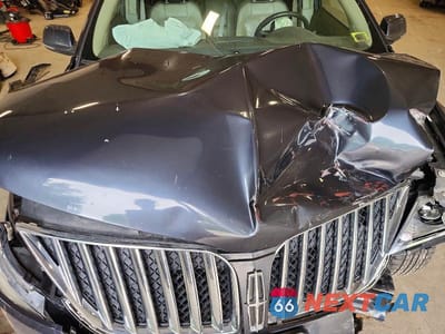 Zdjęcie 12 z 14 samochodu: 2013 LINCOLN MKX VIN:2LMDJ8JK3DBL22200 - miniatura