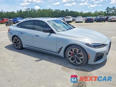 Czwarte zdjęcie samochodu z boku: 2024 BMW M440XI GRAN COUPE VIN:WBA13AW04RFR22612 - miniatura
