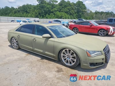 Czwarte zdjęcie samochodu z boku: 2011 AUDI A8 L QUATTRO VIN:WAURVAFD5BN012091 - miniatura