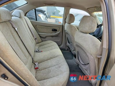 Zdjęcie 10 z 12 samochodu: 2003 HYUNDAI ELANTRA GLS VIN:KMHDN45D83U473840 - miniatura