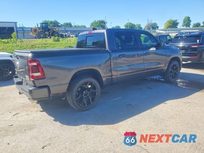 Czwarte zdjęcie samochodu z boku: 2023 RAM 1500 LARAMIE VIN:1C6SRFJT3PN652156 - miniatura