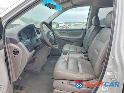 Zdjęcie 7 z 13 samochodu: 2002 HONDA ODYSSEY EXL VIN:2HKRL18032H514861 - miniatura