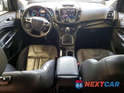 Zdjęcie 8 z 13 samochodu: 2013 FORD ESCAPE TITANIUM VIN:1FMCU9J95DUA45447 - miniatura
