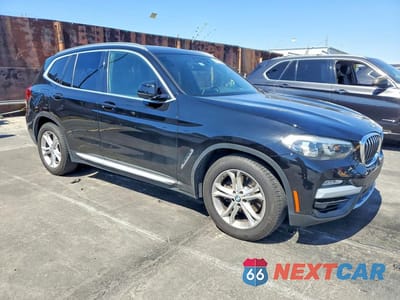 Czwarte zdjęcie samochodu z boku: 2019 BMW X3 SDRIVE30I VIN:5UXTR7C52KLF32811 - miniatura