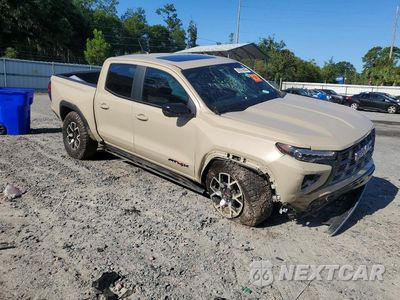 Czwarte zdjęcie samochodu z boku: 2024 GMC CANYON AT4X VIN:1GTP6EEK3R1129197 - miniatura