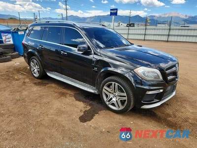Czwarte zdjęcie samochodu z boku: 2015 MERCEDES-BENZ GL 63 AMG VIN:4JGDF7EE1FA541957 - miniatura
