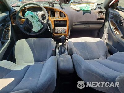 Zdjęcie 8 z 12 samochodu: 2004 HYUNDAI ELANTRA GLS/GT VIN:KMHDN46DX4U909507 - miniatura