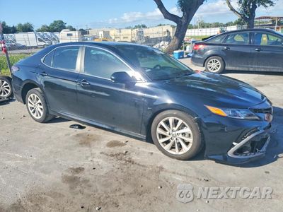 Czwarte zdjęcie samochodu z boku: 2024 TOYOTA CAMRY LE VIN:4T1C11AK8RU204272 - miniatura
