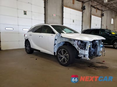 Czwarte zdjęcie samochodu z boku: 2023 LEXUS RX 350 PREMIUM VIN:2T2BAMCAXPC020849 - miniatura