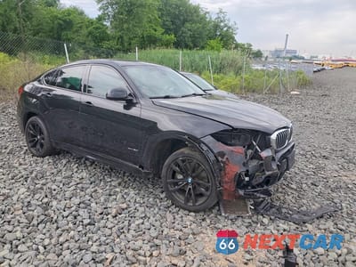 Czwarte zdjęcie samochodu z boku: 2019 BMW X6 XDRIVE50I VIN:5UXKU6C57KLP60627 - miniatura