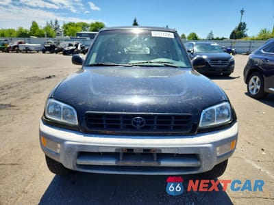 Piąte zdjęcie samochodu w środku: 1998 TOYOTA RAV4 BASE VIN:JT3HP10V1W7075679 - miniatura